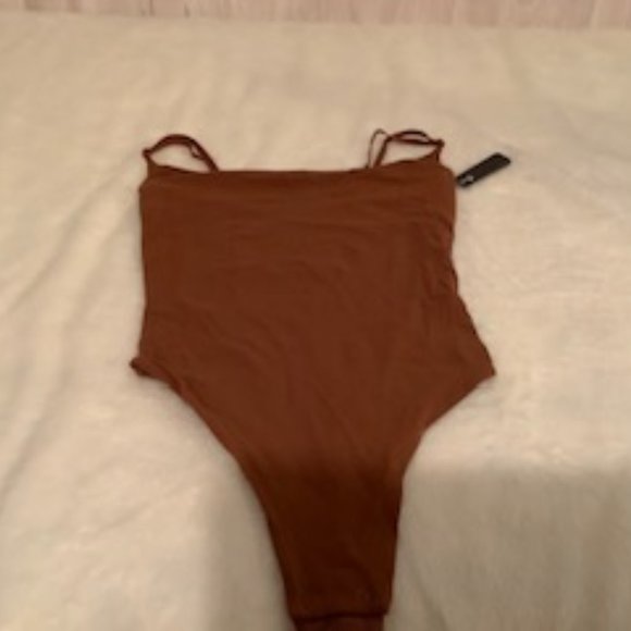 SKIMS Tops - SKIMS Copper Thong Bodysuit- NWT